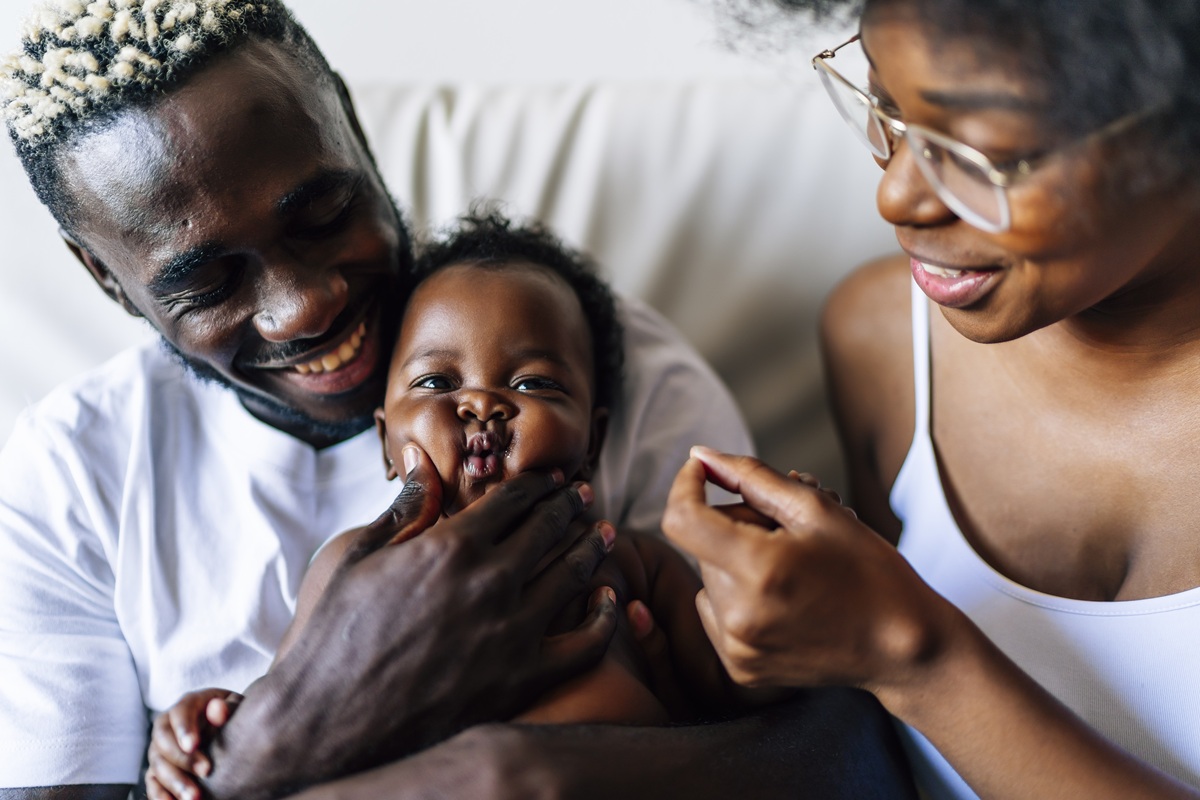 Cheerful family of African